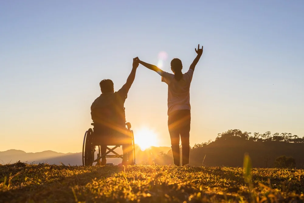 Disabled Man with NDIS Staff